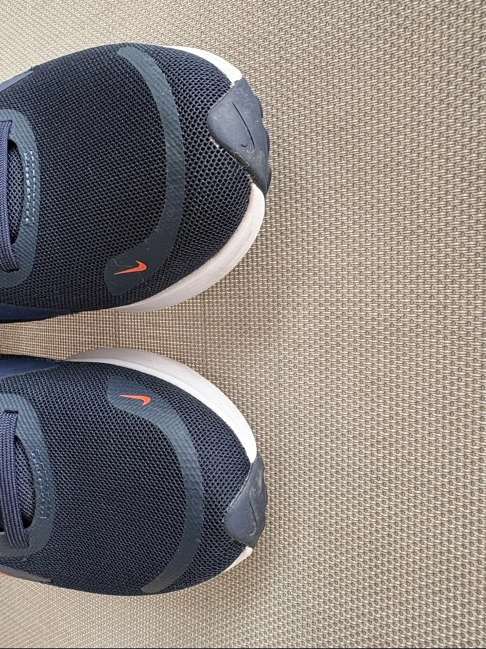 Nike Stylish Navy and Teal Women’s Running Sneakers with Orange Swoosh